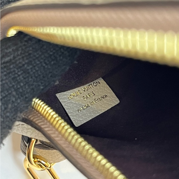 🎀 Louis Vuitton Turtle Dove Monogram Giant Empreinte Leather Neverfull Pochette - Picture 9 of 15